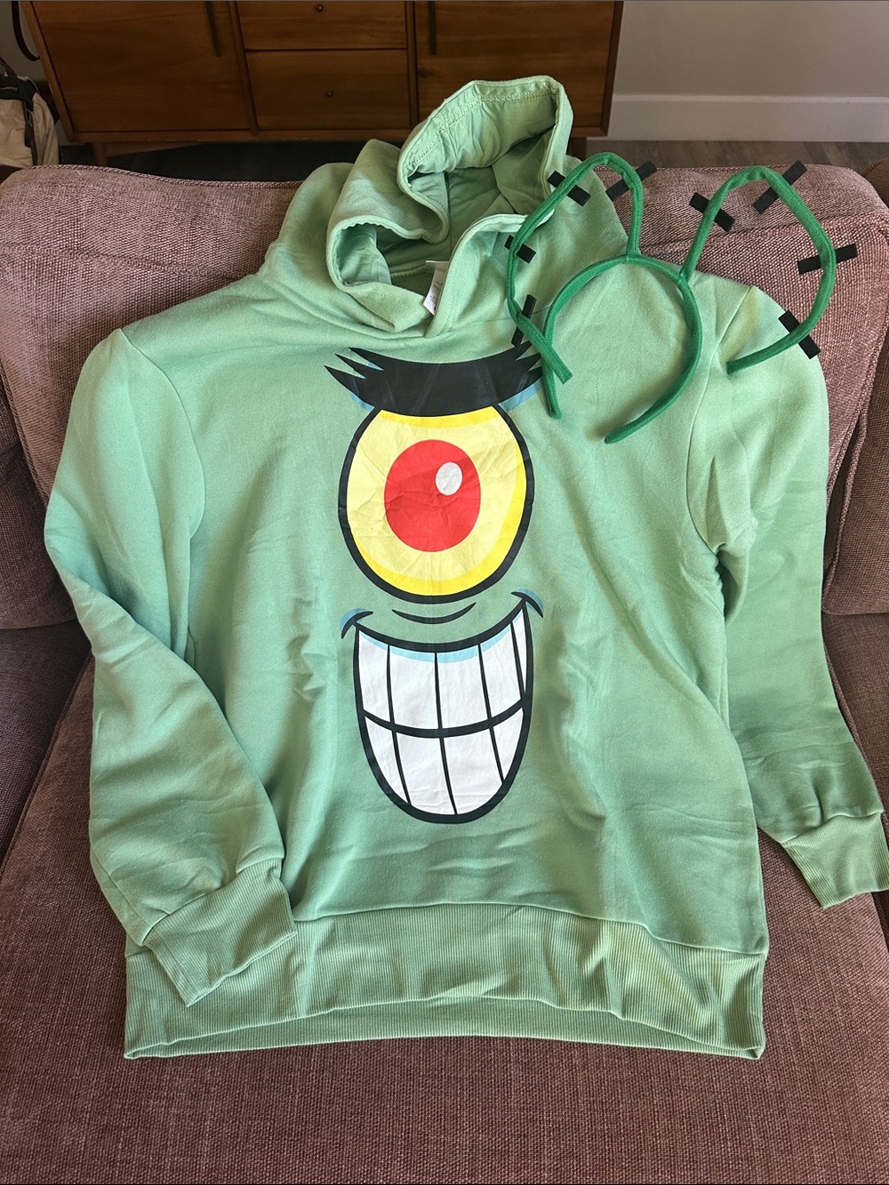 Kids Green Graphic Hoodie with Playful Monster Face